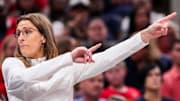 Indiana Fever head coach Stephanie White points to the team’s side of the court Thursday, July 3, 2025, during a game between the Indiana Fever and the Las Vegas Aces at Gainbridge Fieldhouse in Indianapolis.