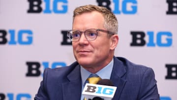 Oct 3, 2024; Rosemont, IL, USA; Michigan head coach Dusty May takes a question at the podium during the 2024 Big Ten Menís Basketball media day at Donald E. Stephens Convention Center. Mandatory Credit: Melissa Tamez-Imagn Images
