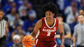 Jan 18, 2025; Lexington, Kentucky, USA; Alabama Crimson Tide guard Aden Holloway (2) brings the ball up court during the first half against the Kentucky Wildcats at Rupp Arena at Central Bank Center. Mandatory Credit: Jordan Prather-Imagn Images