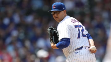 May 31, 2024; Chicago, Illinois, USA; Chicago Cubs pitcher Javier Assad (72) looks to first base during the fourth inning against the Cincinnati Reds at Wrigley Field. Mandatory Credit: Melissa Tamez-USA TODAY Sports