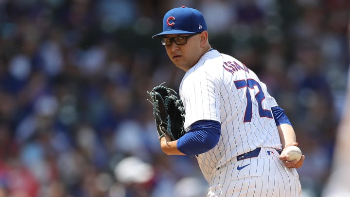 May 31, 2024; Chicago, Illinois, USA; Chicago Cubs pitcher Javier Assad (72) looks to first base during the fourth inning against the Cincinnati Reds at Wrigley Field. Mandatory Credit: Melissa Tamez-USA TODAY Sports