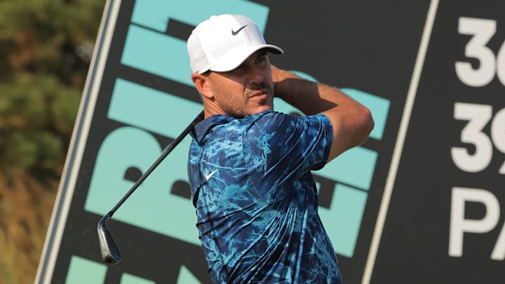Brooks Koepka of the Smash GC watches his shot on the second hole of the first round of the LIV Golf Chicago tournament at Bolingbrook Golf Club. Brooks Koepka of the Smash GC watches his shot on the second hole of the first round of the LIV Golf Chicago tournament at Bolingbrook Golf Club.