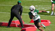 Jul 24, 2025; Florham Park, NY, USA; New York Jets running back Breece Hall (20) participates in a drill during training camp at Atlantic Health Jets Training Center. Mandatory Credit: John Jones-Imagn Images