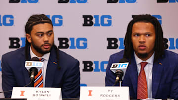 Oct 3, 2024; Rosemont, IL, USA; Illinois guard Kylan Boswell and Illinois guard/forward Ty Rodgers take a question at the podium during the 2024 Big Ten Menís Basketball media day at Donald E. Stephens Convention Center. Mandatory Credit: Melissa Tamez-Imagn Images