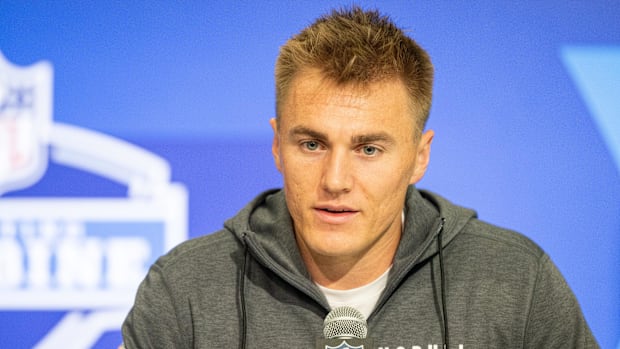 Mar 1, 2024; Indianapolis, IN, USA; Oregon quarterback Bo Nix (QB07) talks to the media during the 2024 NFL Combine