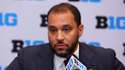 Oct 3, 2024; Rosemont, IL, USA; Minnesota head coach Ben Johnson takes a question at the podium during the 2024 Big Ten Menís Basketball media day at Donald E. Stephens Convention Center. Mandatory Credit: Melissa Tamez-Imagn Images