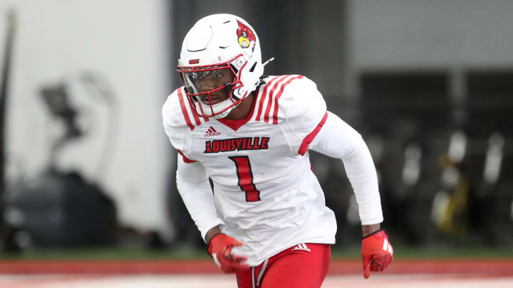 Louisville’s Ja'Corey Brooks (1) runs to catch the ball during Spring Practice