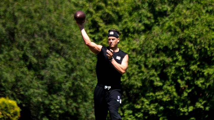 Cincinnati Bengals quarterback Joe Burrow (9) throws a pass during a practice session at the Kettering Health Practice Fields in Cincinnati on Tuesday, May 12, 2026.
