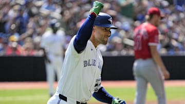 Jul 5, 2025; Toronto, Ontario, CAN; Toronto Blue Jays left fielder George Springer (4) reacts as he runs to first base on his two run home run against the Los Angeles Angels during the third inning at Rogers Centre. Mandatory Credit: John E. Sokolowski-Imagn Images