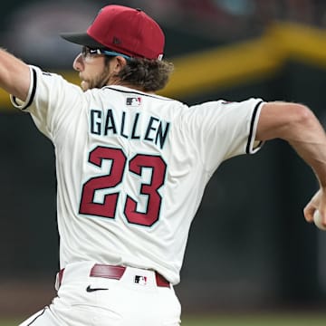 Mar 27, 2025; Phoenix, Arizona, USA; Arizona Diamondbacks pitcher Zac Gallen (23) pitches against the Chicago Cubs during the fourth inning at Chase Field.