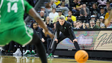 Jan 29, 2025; Wichita, Kansas, USA; North Texas Mean Green coach Ross Hodge watches game play during the first half against the Wichita State Shockers at Charles Koch Arena. Mandatory Credit: William Purnell-Imagn Images
