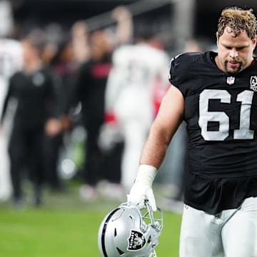 Dec 16, 2024; Paradise, Nevada, USA; Las Vegas Raiders guard Jordan Meredith (61) walks off the field after the Raiders were defeated by the Atlanta Falcons at Allegiant Stadium. Mandatory Credit: Stephen R. Sylvanie-Imagn Images