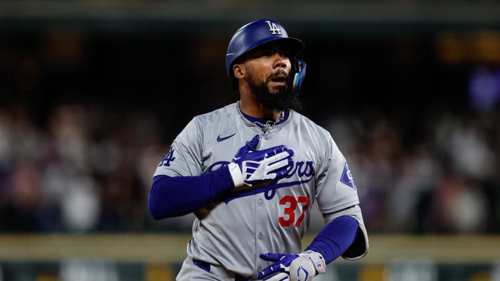 Los Angeles Dodgers right fielder Teoscar Hernandez (37) gestures as he rounds the bases on a three run home run in the ninth inning against the Colorado Rockies at Coors Field on June 18.