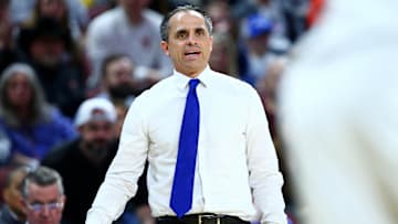 Mar 22, 2025; Wichita, KS, USA; Drake Bulldogs head coach Ben McCollum reacts after a play against the Texas Tech Red Raiders during the first half at Intrust Bank Arena. Mandatory Credit: Nick Tre. Smith-Imagn Images
