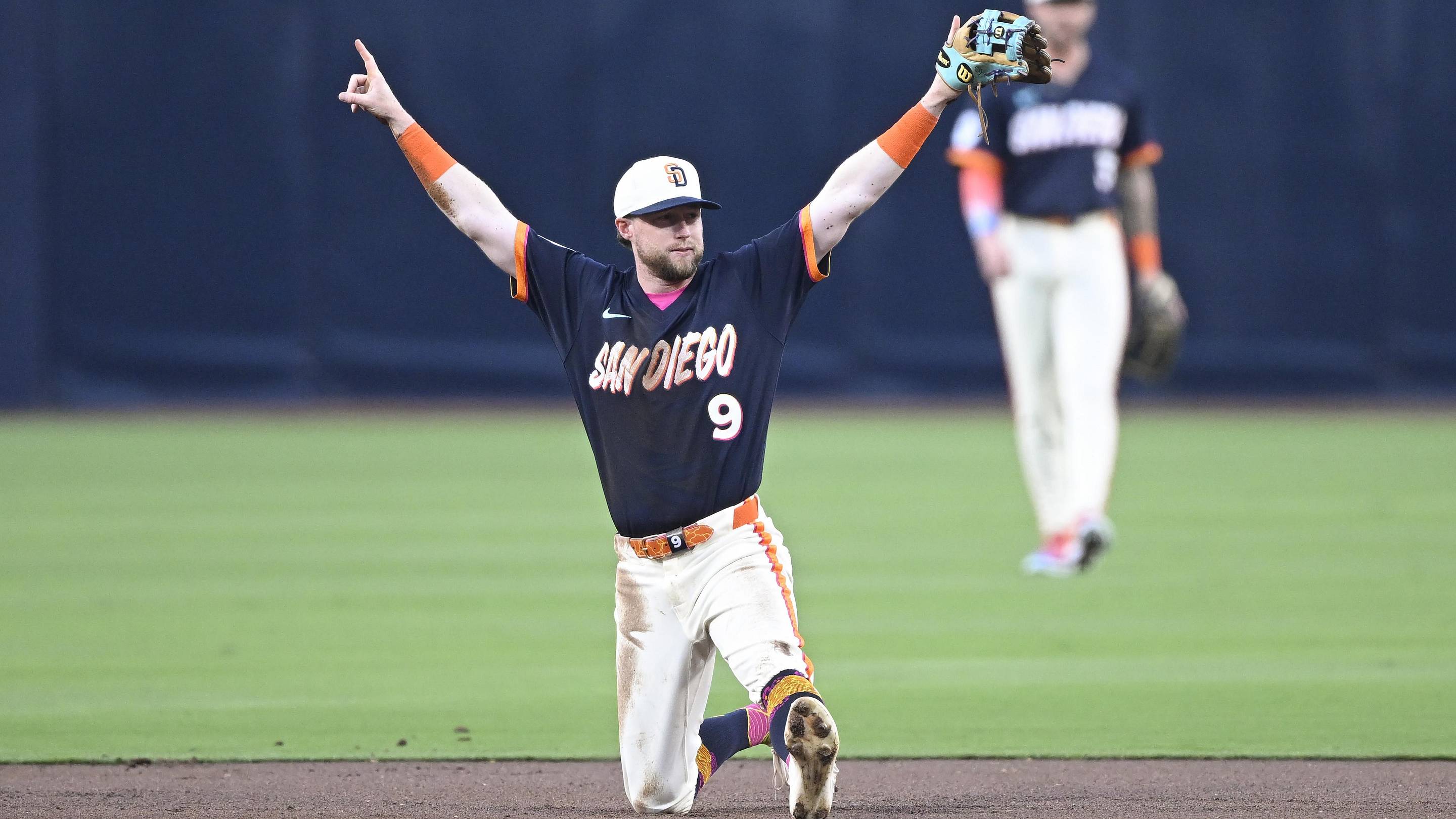 San Diego Padres second baseman Jake Cronenworth (9) celebrates after turning a double play during the first inning against the Colorado Rockies at Petco Park on April 10, 2026.