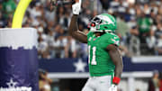 Nov 23, 2025; Arlington, Texas, USA; Philadelphia Eagles wide receiver AJ. Brown (11) celebrates a touchdown in the first quarter against the Dallas Cowboys  at AT&T Stadium. Mandatory Credit: Kevin Jairaj-Imagn Images