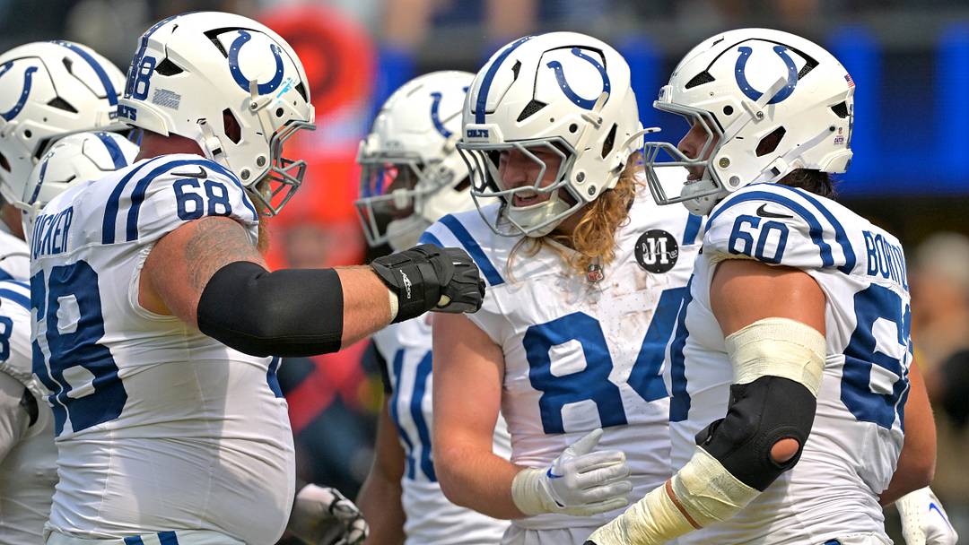 Sep 28, 2025; Inglewood, California, USA; Indianapolis Colts  tight end Tyler Warren (84) is congratulated by guard Dalton Tucker (68) and center Tanor Bortolini (60) after a touchdown in the first half against the Los Angeles Rams at SoFi Stadium. Mandatory Credit: Jayne Kamin-Oncea-Imagn Images