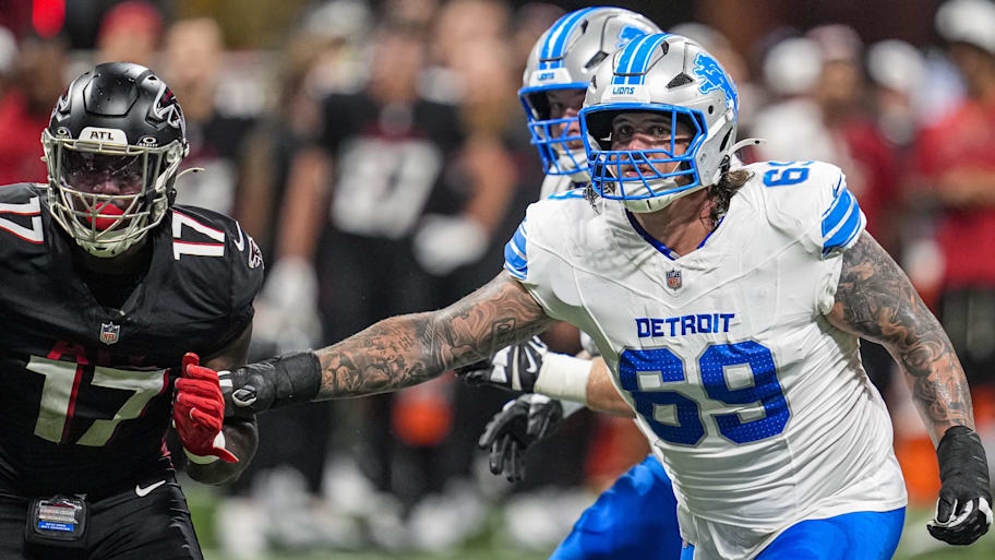 Aug 8, 2025; Atlanta, Georgia, USA; Detroit Lions guard Tate Ratledge (69) blocks Atlanta Falcons linebacker Arnold Ebiketie (17) during the second quarter at Mercedes-Benz Stadium. Mandatory Credit: Dale Zanine-Imagn Images | Dale Zanine-Imagn Images