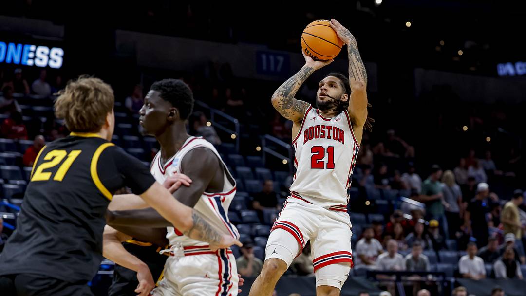 Mar 19, 2026; Oklahoma City, OK, USA; Houston Cougars guard Emanuel Sharp (21) takes a shot during a first round game of the men's 2026 NCAA Tournament at Paycom Center. Mandatory Credit: Alonzo Adams-Imagn Images