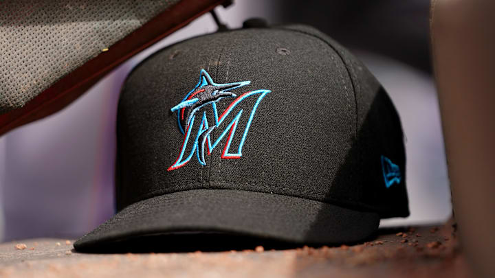 Apr 11, 2019; Cincinnati, OH, USA; A view of a New Era Miami Marlins hat in the dugout during the game against the Cincinnati Reds at Great American Ball Park. Mandatory Credit: Aaron Doster-Imagn Images Apr 11, 2019; Cincinnati, OH, USA; A view of a New Era Miami Marlins hat in the dugout during the game against the Cincinnati Reds at Great American Ball Park. Mandatory Credit: Aaron Doster-Imagn Images