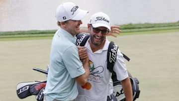 Mar 9, 2025; Orlando, Florida, USA;  Russell Henley (left) hugs his caddie after winning the Arnold Palmer Invitational golf tournament at Bay Hill. Mandatory Credit: Reinhold Matay-Imagn Images