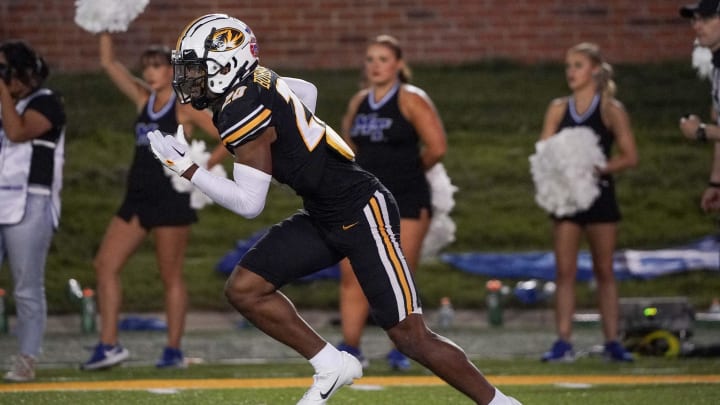 Sep 9, 2023; Columbia, Missouri, USA; Missouri Tigers defensive back Marvin Burks Jr. (20) returns a kick against the Middle Tennessee Blue Raiders during the game at Faurot Field at Memorial Stadium. Mandatory Credit: Denny Medley-USA TODAY Sports