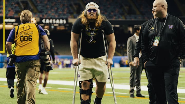 Landen Hatchett attended the Sugar Bowl on crutches after suffering a knee injury and having surgery. 