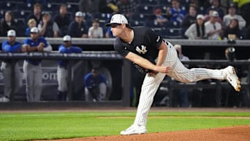 Feb 28, 2025; Tampa, Florida, USA; New York Yankees pitcher Gerrit Cole (45) throws a pitch against the Toronto Blue Jays during the first inning at George M. Steinbrenner Field. Mandatory Credit: Dave Nelson-Imagn Images