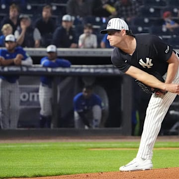 Feb 28, 2025; Tampa, Florida, USA; New York Yankees pitcher Gerrit Cole (45) throws a pitch against the Toronto Blue Jays during the first inning at George M. Steinbrenner Field. Mandatory Credit: Dave Nelson-Imagn Images