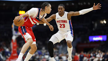 Nov 17, 2024; Washington, District of Columbia, USA; Washington Wizards forward Kyshawn George (18) dribbles the ball as Detroit Pistons guard Jaden Ivey (23) defends: Geoff Burke-Imagn Images