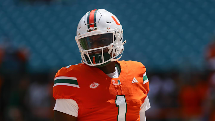 Sep 14, 2024; Miami Gardens, Florida, USA; Miami Hurricanes quarterback Cam Ward (1) looks on from the field before the game against the Ball State Cardinals at Hard Rock Stadium. Mandatory Credit: Sam Navarro-Imagn Images