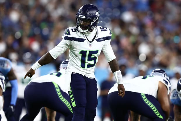 Seattle Seahawks quarterback PJ Walker (15) gives instructions to his team in the fourth quarter.