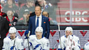 Apr 3, 2025; Ottawa, Ontario, CAN; Tampa Bay Lightning Head coach Jon Cooper follows the action in the third period against the  Ottawa Senators at the Canadian Tire Centre. Mandatory Credit: Marc DesRosiers-Imagn Images