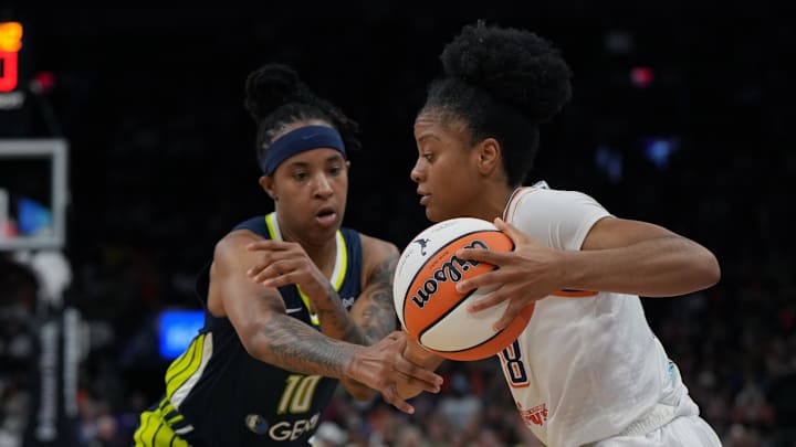 Jul 7, 2025; Phoenix, Arizona, USA; Phoenix Mercury guard Monique Akoa Makani (8) drives against Dallas Wings guard Aziaha James (10) in the second half at Footprint Center. Mandatory Credit: Rick Scuteri-Imagn Images Jul 7, 2025; Phoenix, Arizona, USA; Phoenix Mercury guard Monique Akoa Makani (8) drives against Dallas Wings guard Aziaha James (10) in the second half at Footprint Center. Mandatory Credit: Rick Scuteri-Imagn Images
