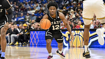 Mar 13, 2025; Nashville, TN, USA;  Mississippi State Bulldogs guard Josh Hubbard (12) dribbles the ball against the Missouri Tigers during the second half at Bridgestone Arena. 