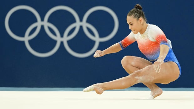 Levi Ruivivar of Philippines performs on the floor exercise in women's qualification