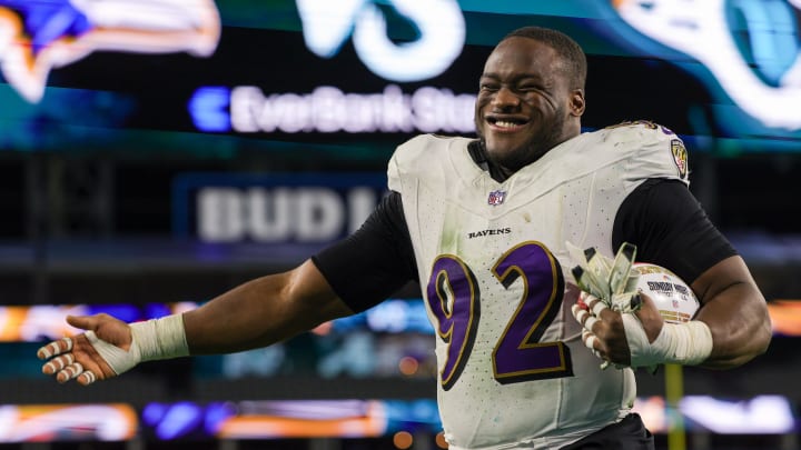 Dec 17, 2023; Jacksonville, Florida, USA;  Baltimore Ravens defensive tackle Justin Madubuike (92) celebrates after beating the Jacksonville Jaguars at EverBank Stadium. Mandatory Credit: Nathan Ray Seebeck-USA TODAY Sports