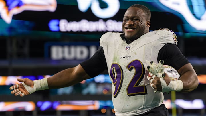 Dec 17, 2023; Jacksonville, Florida, USA;  Baltimore Ravens defensive tackle Justin Madubuike (92) celebrates after beating the Jacksonville Jaguars at EverBank Stadium. Mandatory Credit: Nathan Ray Seebeck-Imagn Images