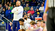 Feb 19, 2025; South Bend, Indiana, USA; Notre Dame Fighting Irish head coach Micah Shrewsberry watches in the first half against the SMU Mustangs at the Purcell Pavilion. 