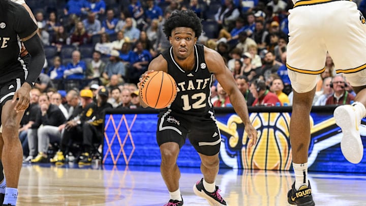 Mar 13, 2025; Nashville, TN, USA;  Mississippi State Bulldogs guard Josh Hubbard (12) dribbles the ball against the Missouri Tigers during the second half at Bridgestone Arena. Mandatory Credit: Steve Roberts-Imagn Images