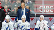 Apr 3, 2025; Ottawa, Ontario, CAN; Tampa Bay Lightning Head coach Jon Cooper follows the action in the third period against the  Ottawa Senators at the Canadian Tire Centre. Mandatory Credit: Marc DesRosiers-Imagn Images