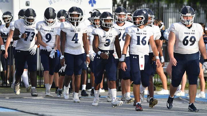 The North Port Bobcats march onto the field as Darth Vader's Imperial March music plays on the public address system. The IMG Academy Blue Ascenders hosted the North Port Bobcats for a Thursday night varsity football game in Bradenton. The North Port Bobcats march onto the field as Darth Vader's Imperial March music plays on the public address system. The IMG Academy Blue Ascenders hosted the North Port Bobcats for a Thursday night varsity football game in Bradenton.