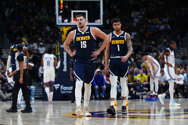 Denver Nuggets center Nikola Jokic (15) and Denver Nuggets forward Michael Porter Jr. (1)