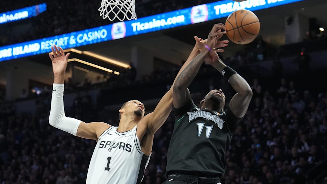 May 15, 2026; Minneapolis, Minnesota, USA; San Antonio Spurs forward Victor Wembanyama (1) and Minnesota Timberwolves center Naz Reid (11) jump for a rebound in the first half during game six of the second round of the 2026 NBA Playoffs at Target Center. Mandatory Credit: Jesse Johnson-Imagn Images May 15, 2026; Minneapolis, Minnesota, USA; San Antonio Spurs forward Victor Wembanyama (1) and Minnesota Timberwolves center Naz Reid (11) jump for a rebound in the first half during game six of the second round of the 2026 NBA Playoffs at Target Center. Mandatory Credit: Jesse Johnson-Imagn Images