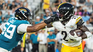 Jacksonville Jaguars defensive end Myles Cole (59) face masks Pittsburgh Steelers running back Kaleb Johnson (20) during the first half of the first preseason game where the Jacksonville Jaguars hosted the Pittsburgh Steelers Saturday Aug. 9, 2025, at EverBank Stadium in Jacksonville, Fla.