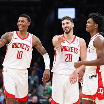 Nov 1, 2025; Boston, Massachusetts, USA; Houston Rockets forward Jabari Smith (10) and center Alperen Sengun (28)  celebrate during the second half against the Boston Celtics at TD Garden. Mandatory Credit: Paul Rutherford-Imagn Images