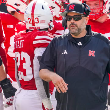 Sep 30, 2023; Lincoln, Nebraska, USA; Nebraska Cornhuskers head coach Matt Rhule walks out of a huddle during their game against the Michigan Wolverines during the first quarter at Memorial Stadium. 