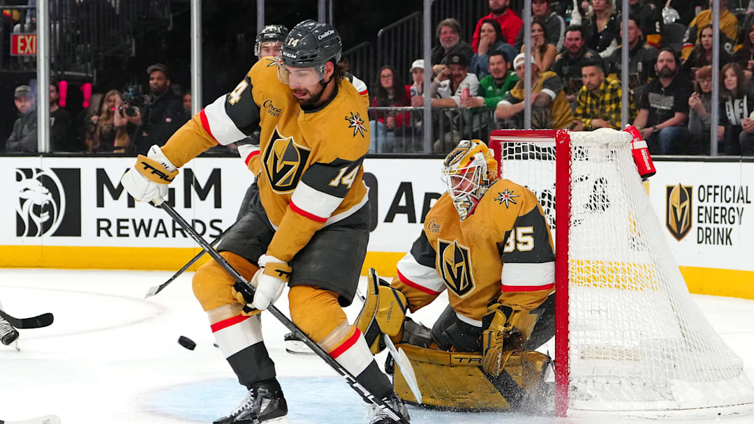 Feb 27, 2025; Las Vegas, Nevada, USA; Vegas Golden Knights defenseman Nicolas Hague (14) looks to block a scoring attempt by the Chicago Blackhawks during the first period at T-Mobile Arena.