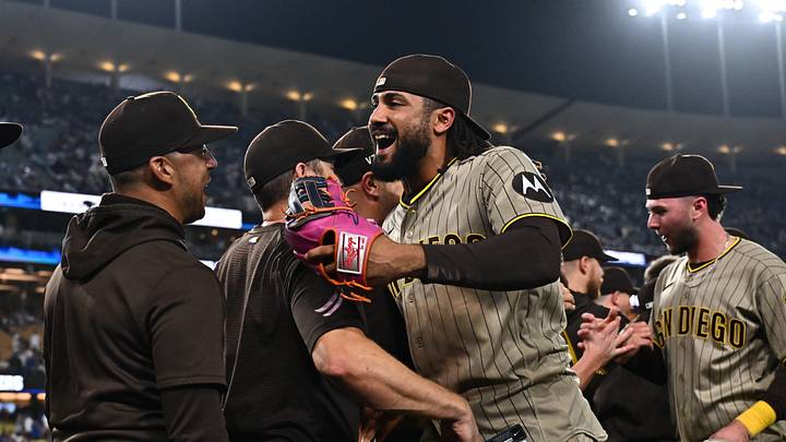Sep 24, 2026; Los Angeles, California, USA;  San Diego Padres right fielder Fernando Tatis Jr. (23) greets teammates after defeating the Los Angeles Dodgers at Dodger Stadium.  Mandatory Credit: William Liang-Imagn Images