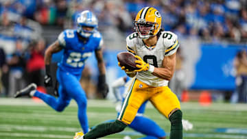 Green Bay Packers wide receiver Christian Watson (9) makes a catch against Detroit Lions during the first half at Ford Field in Detroit on Thursday, Dec. 5, 2024.